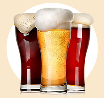 Frothy craft beer in glass tumblers